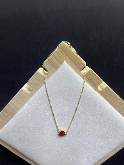 ESCLAVA DE MARIQUITA DE ORO